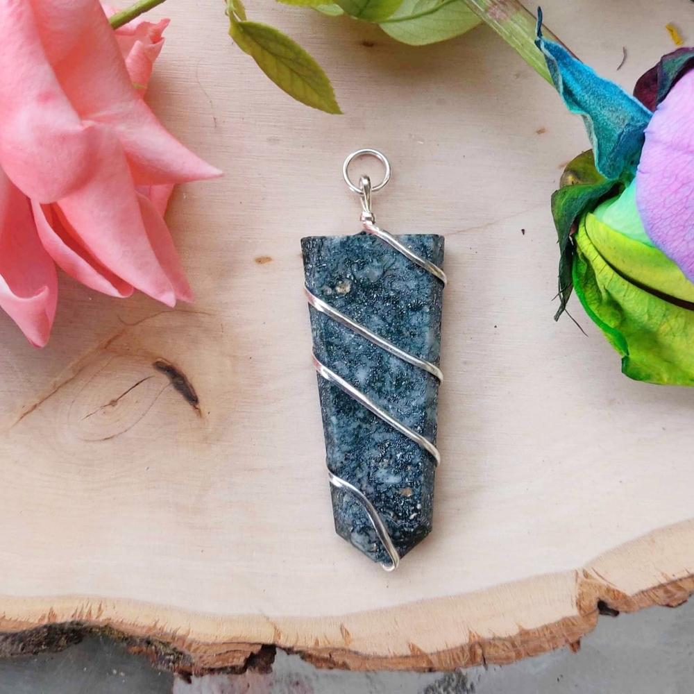Flat Wire Wrapped Crystal Pendant Comes with Free cord chain.